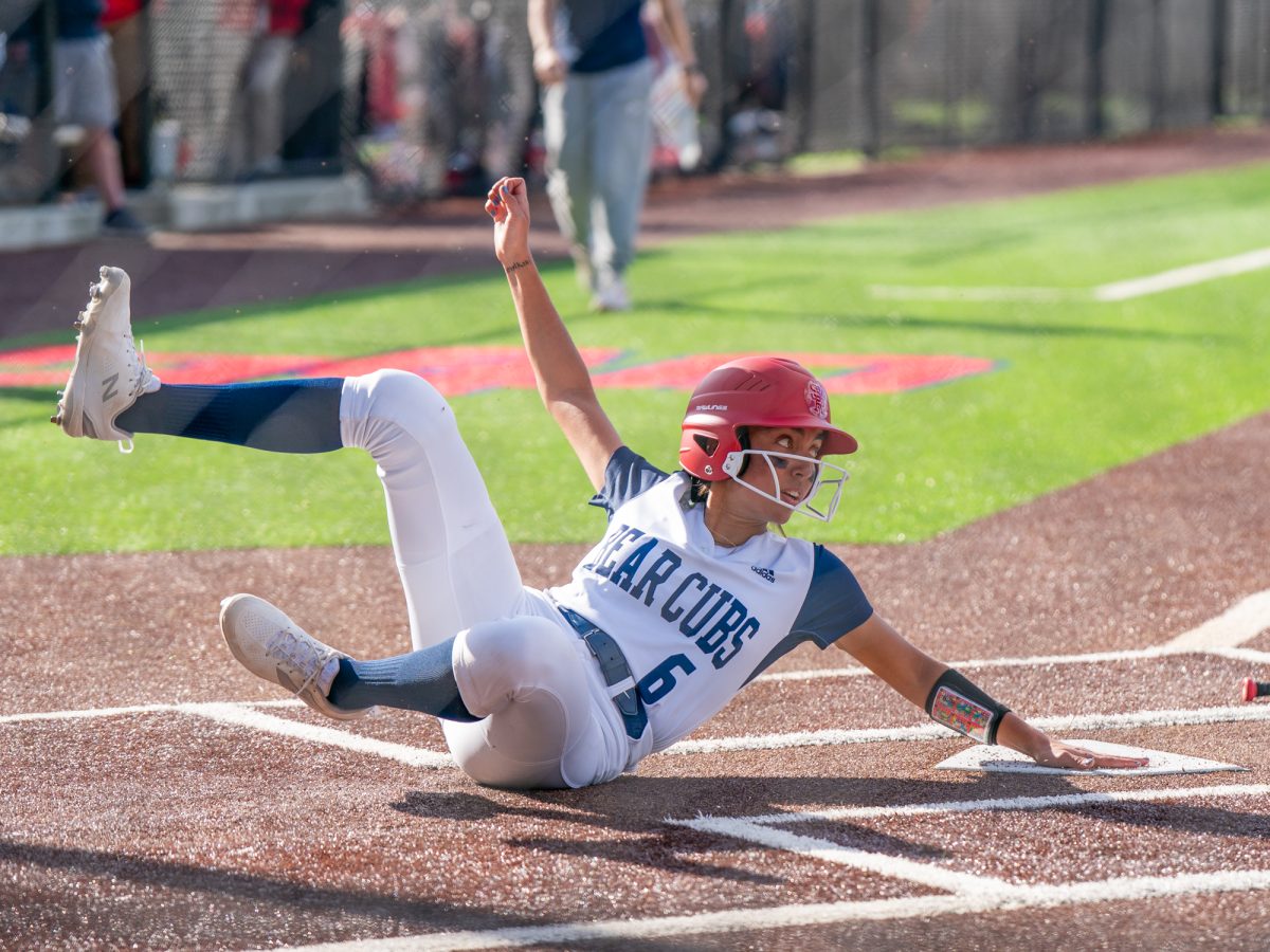 Sophomore catcher Esperanza Marquez slides home for another run for the Bear Cubs against Yuba College at Marv Mayes Field on Feb. 3, 2026.