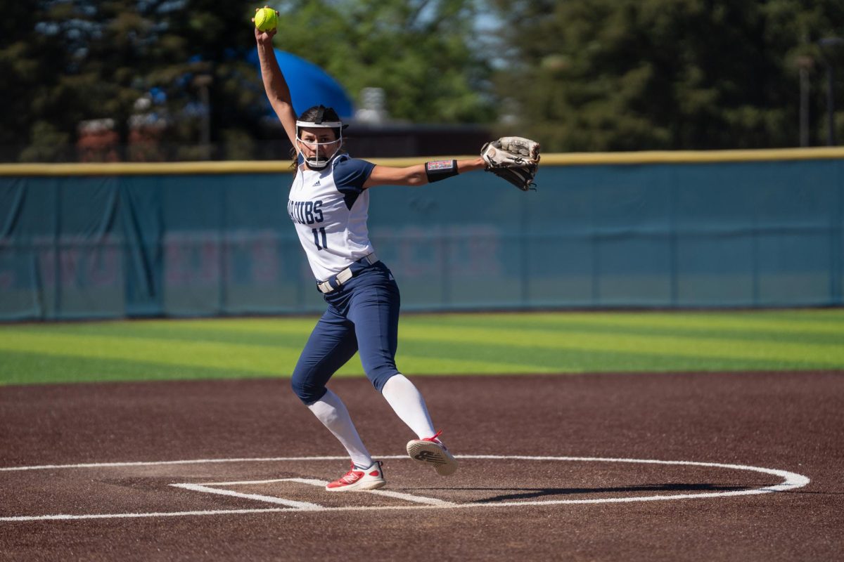 Pitcher Mia Avila launches the ball towards the plate during the game against against Cosumnes River College at home on Tuesday, March 24, 2026.