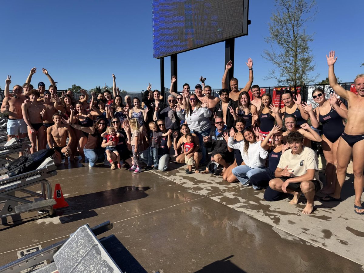 Current varsity swimmers and alumni gather at annual swim meet, Saturday, March. 14 at Quinn Swim Center. 