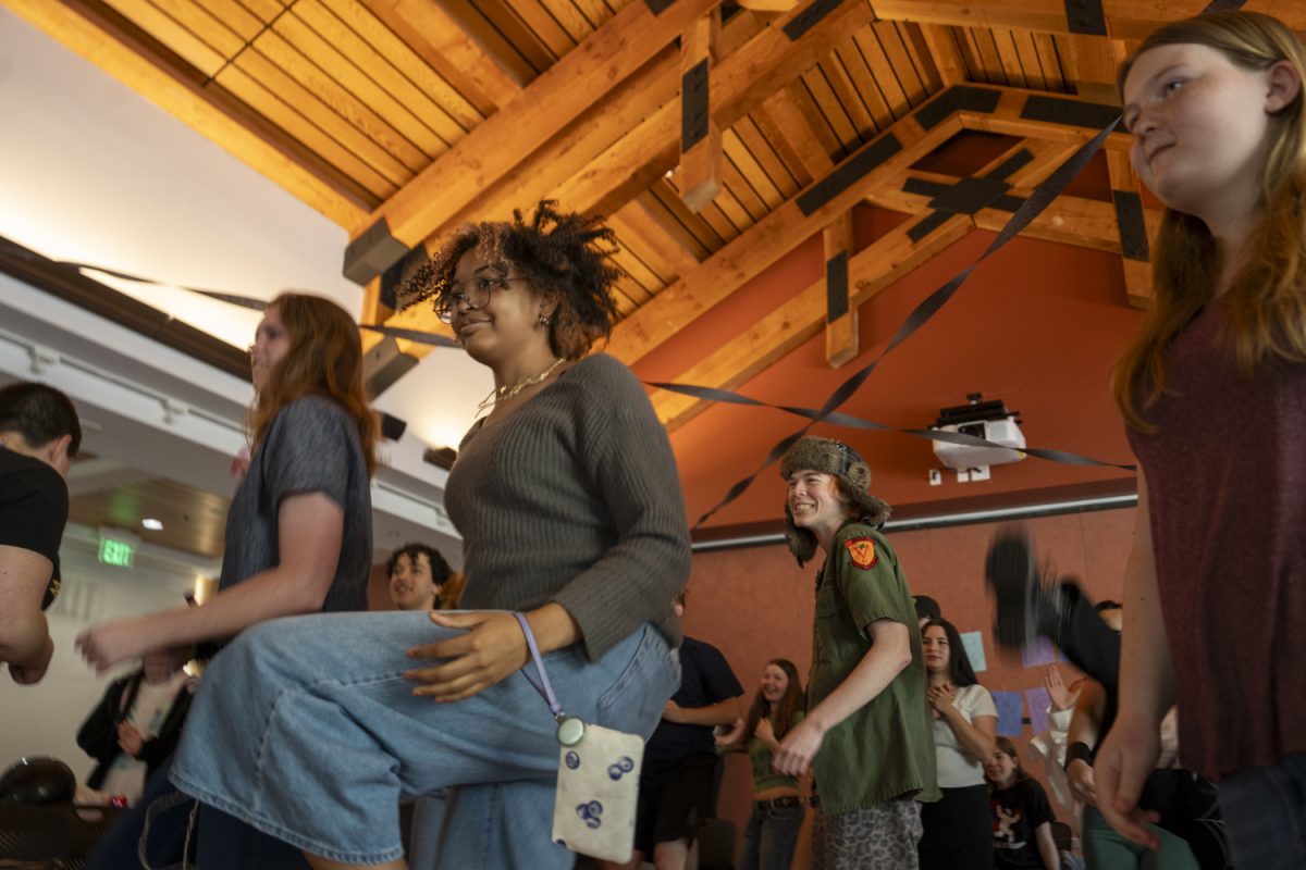 Attendees stand and learn how to line dance from organizers and performers at the Drag Nights at Freddy’s awareness and fundraising event at Santa Rosa Junior College’s Bertolini Student Center March 24, 2026.

