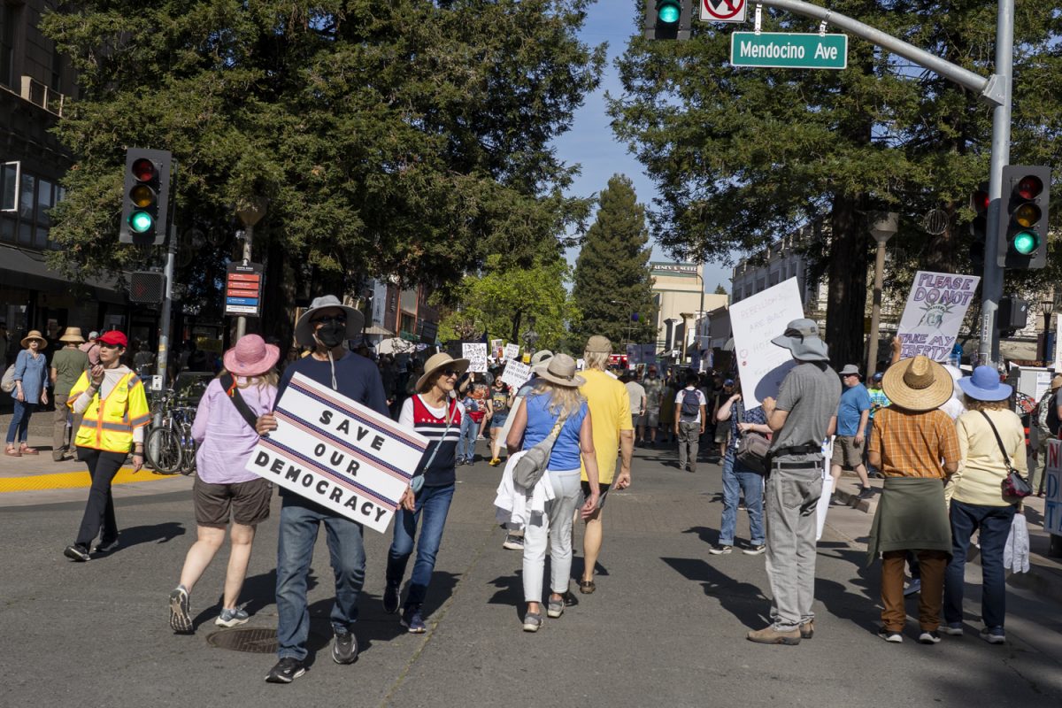 Protesters gather in Old Courthouse Square for the "No Kings" protest to make their voices heard in Santa Rosa, March 28 2026