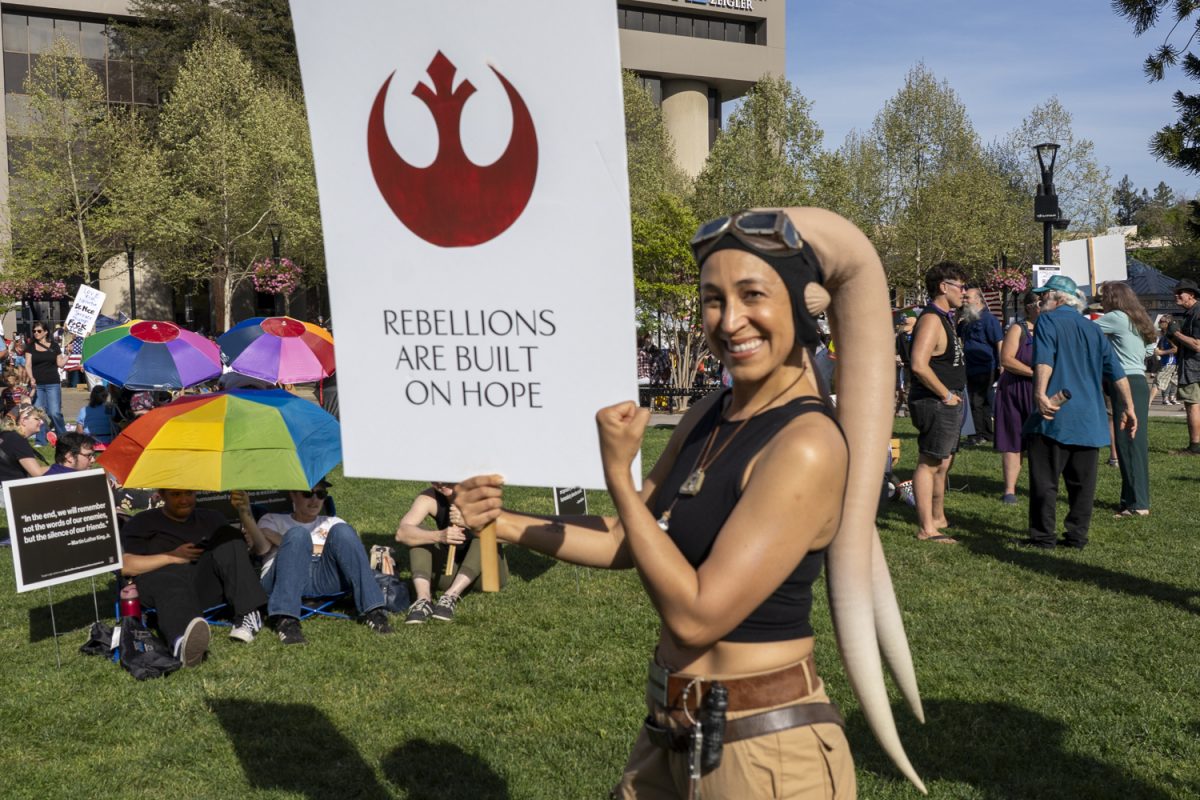 “Rebellions are built on hope and action, so hope to see you at the next protest,” said "Star Wars" enthusiast Erica, 39, in her Akira cosplay at "No Kings" protest, Old Courthouse Square Santa Rosa, March 28, 2026. 