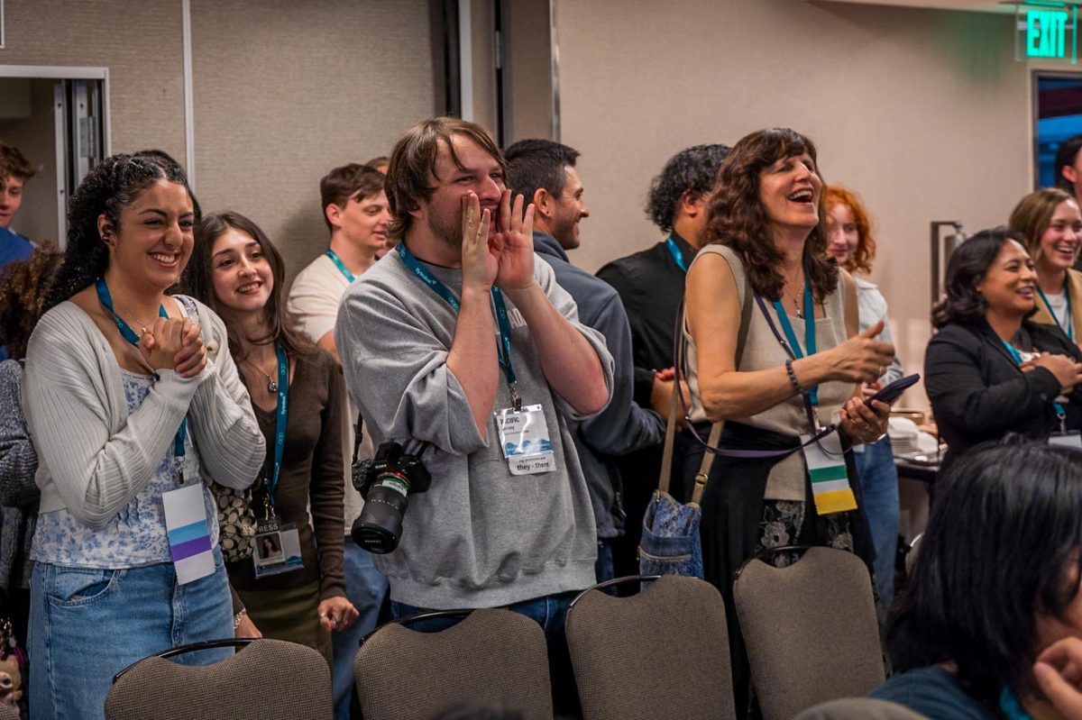 News editor Kinda Hamami (left), reporter Pacific Jeremey (middle) and adviser Anne Belden (right) celebrate one of the Oak Leaf's many wins at the 2026 Associated Collegiate Press Spring National College Media Conference in San Francisco Saturday, March 7, 2026. 