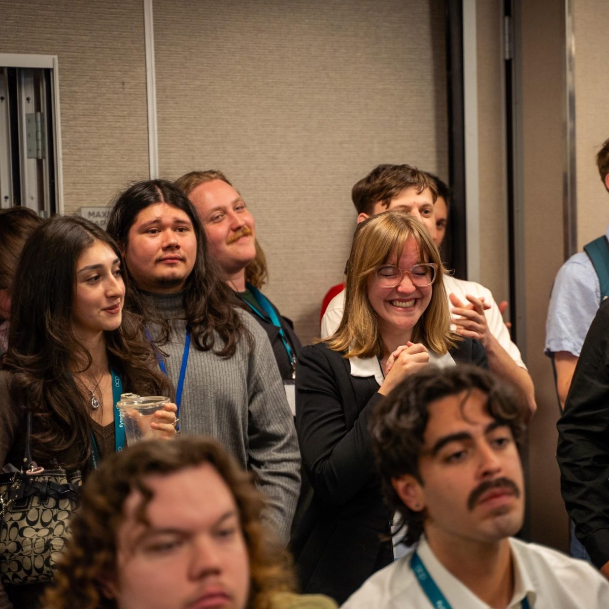 Editor-in-Chief Lauren Kelleher feels the love from her staff as they celebrate her second place award for Sports Feature Photo at the 2026 Associated Collegiate Press Spring National College Media Conference in San Francisco Saturday, March 7, 2026. 