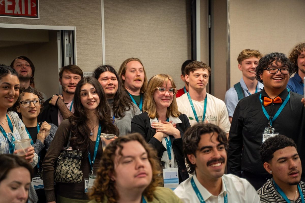 Editor-in-Chief Lauren Kelleher watches as one of her staff members goes up to accept an award at the 2026 Associated Collegiate Press Spring National College Media Conference in San Francisco Saturday, March 7, 2026. 