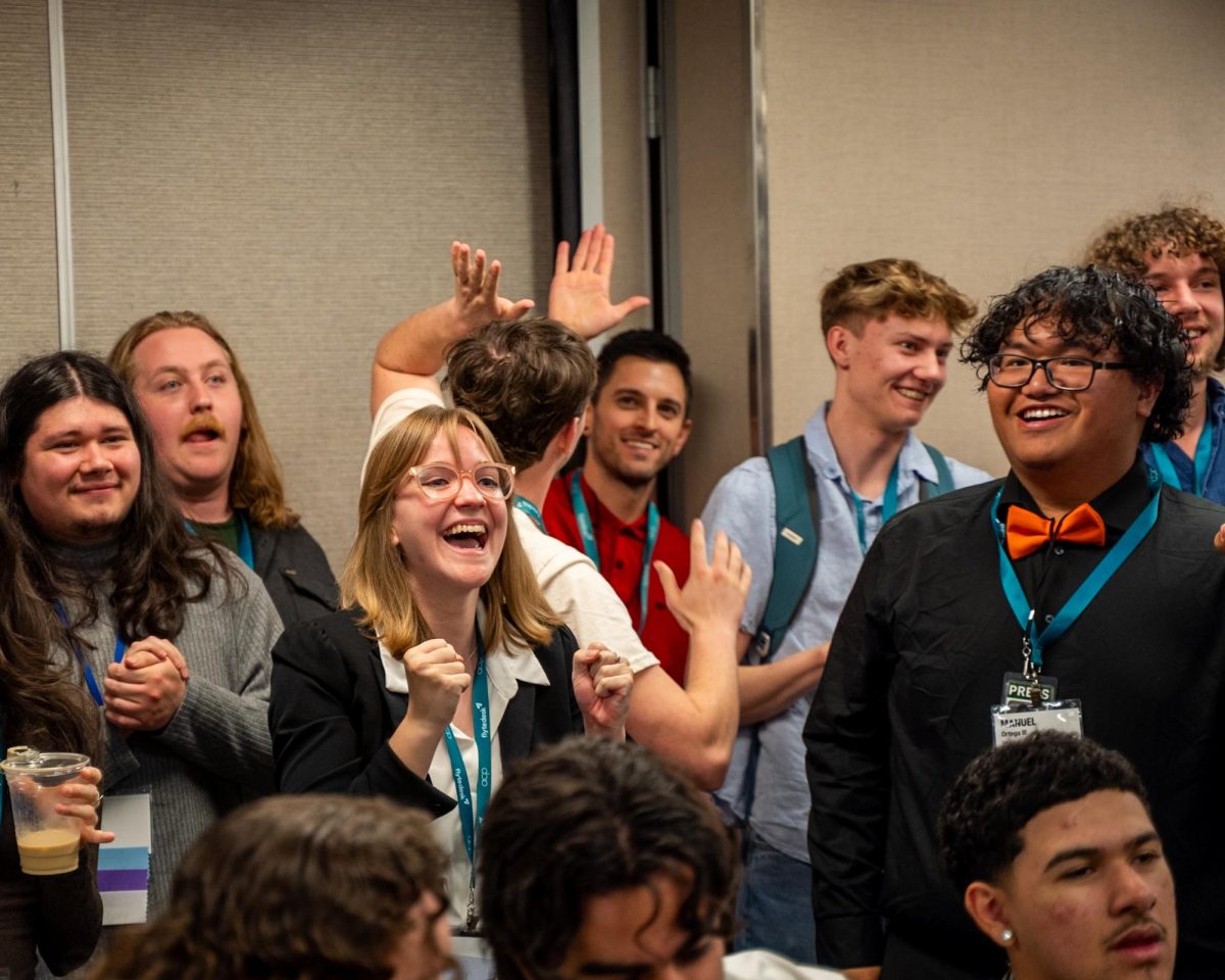 Reporters Jacob Miller and Nick Stalker (right) celebrate their third place win in the on-the-spot Social Media contest at the 2026 Associated Collegiate Press Spring National College Media Conference in San Francisco Saturday, March 7, 2026. 