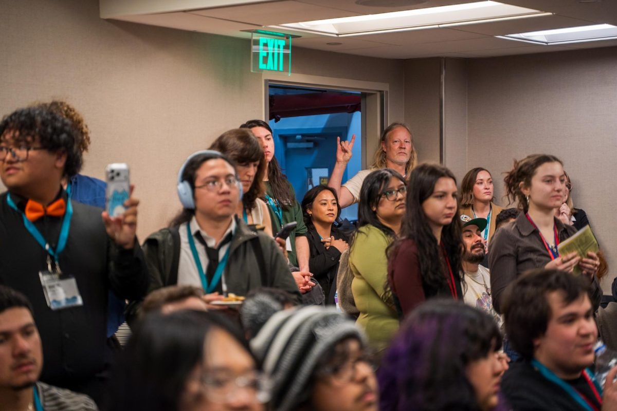 Oak Leaf Peer Assistant Learning Specialist Mark Fernquest rocks out during the awards ceremony at the 2026 Associated Collegiate Press Spring National College Media Conference in San Francisco Saturday, March 7, 2026. 