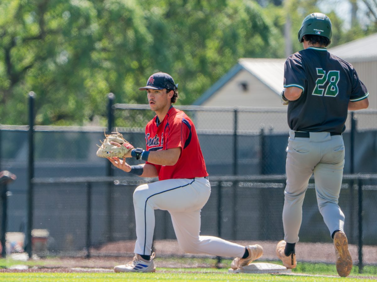 First baseman J.T. Summers reaches to catch the ball while keeping his foot on the bag for the out against Diablo Valley College at home on Friday, March 27, 2026.
