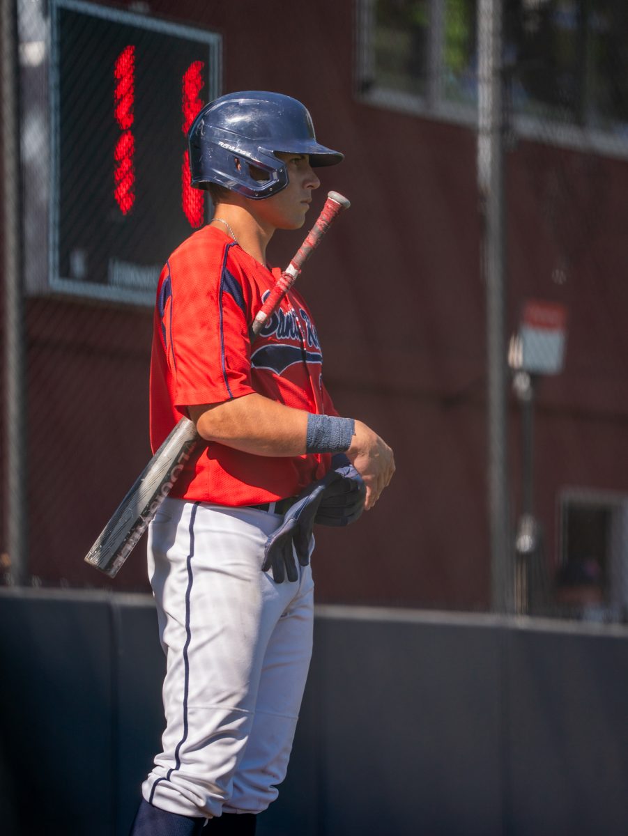 Left fielder Clay De Mars carefully studies the pitcher from the on-deck area during the game against Diablo Valley College at home on Friday, March 27, 2026.