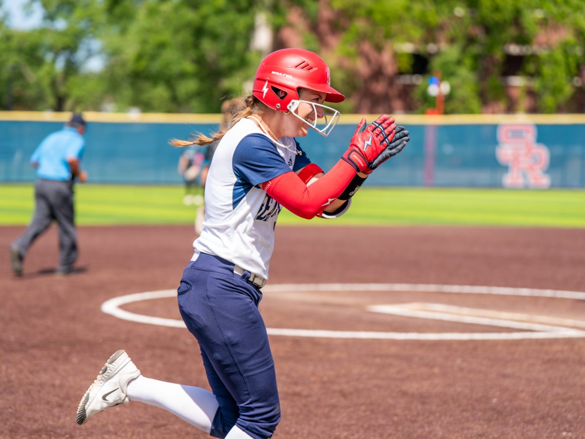 Freshman shortstop Kaihla Jarvinen claps as she heads towards home plate after crushing a solo home run to center field in the bottom of the fourth of the first game against Folsom Lake College at home on Saturday, March 28, 2026.