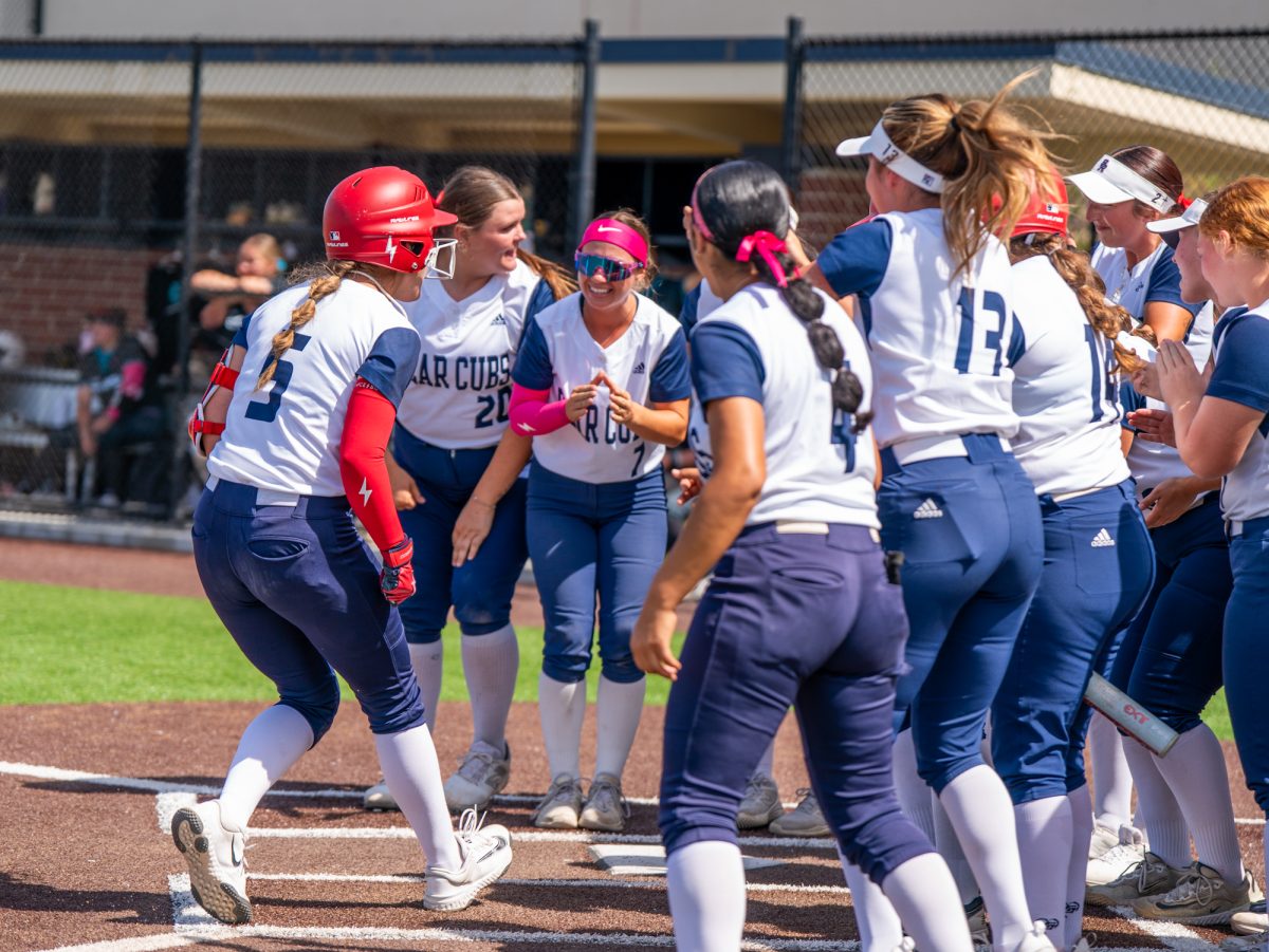 Freshman Kaihla Jarvinen celebrates at home plate with her team after a solo home run to center field in the bottom of the fourth of the first game gets the Bear Cubs on the board against Folsom Lake College at home on Saturday, March 28, 2026.
