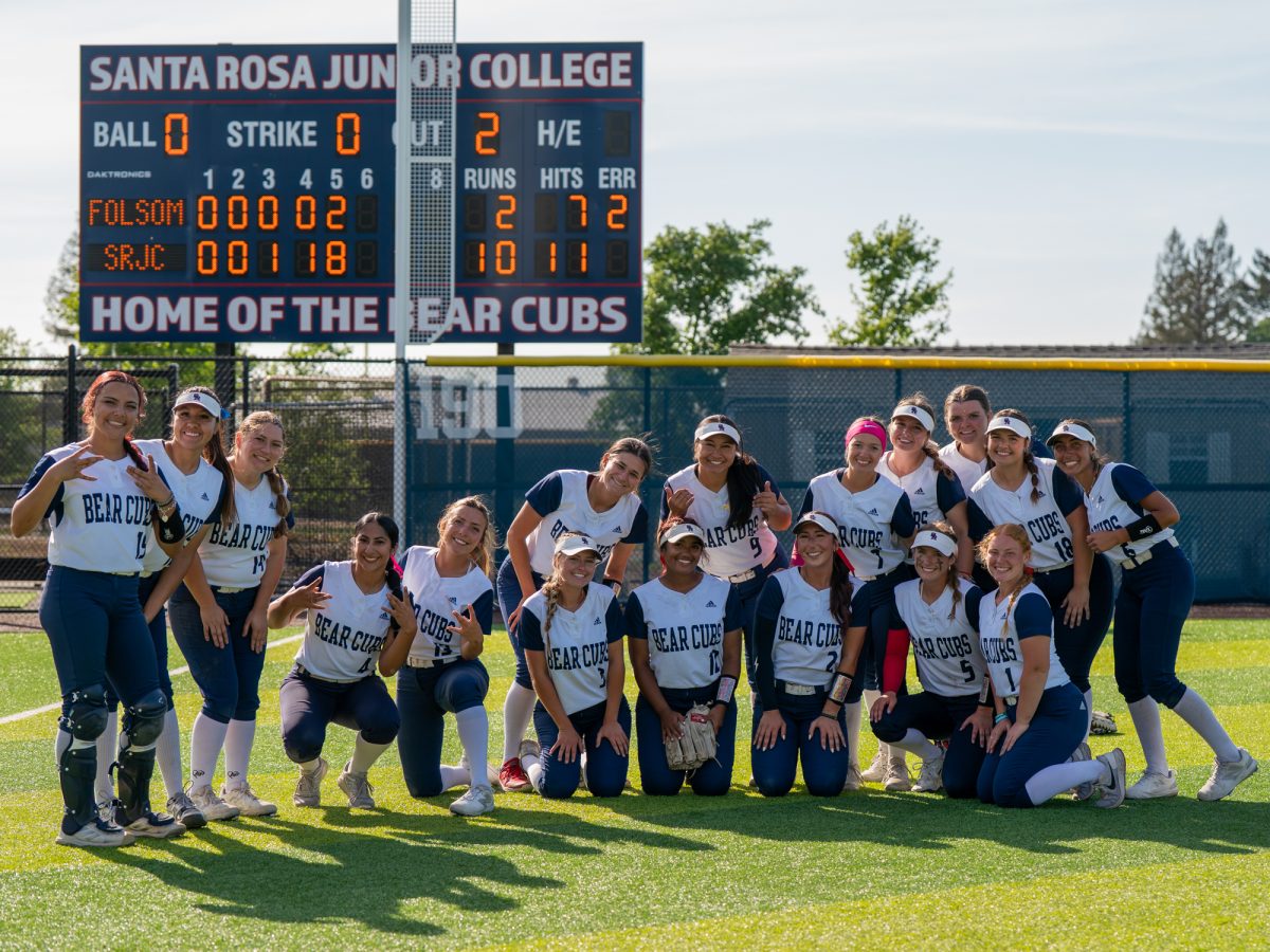 The SRJC softball team gathers in front of the score board after their second game against Folsom Lake College at home on Saturday, March 28, 2026.