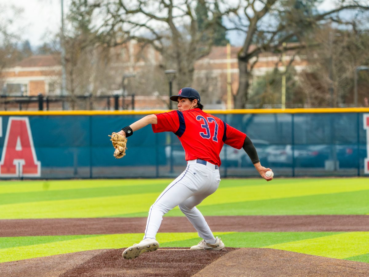 Freshman pitcher Jayden Hunt winds back for a pitch in the top of the seventh against College of Marin at home on February 14, 2026.