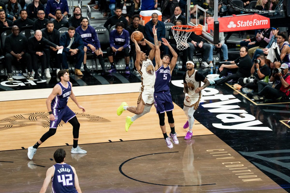Warriors guard De'Anthony Melton takes air and attempts a layup against the Sacramento Kings at Chase Center in San Francisco, Calif. on Tuesday, April 7, 2026.