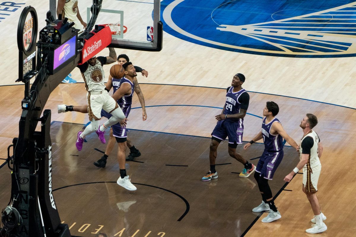 Warriors guard Gary Payton II dunks against the Sacramento Kings at Chase Center in San Francisco, Calif. on Tuesday, April 7, 2026.