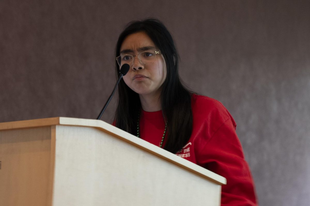 Environmental chemistry major Sophia Nguyen recites a poem about her struggles with mental health, relationship with her mother and westernism for the attendees about the struggles of depression at the Bertolini Student Center, Santa Rosa Junior College Saturday, April 11, 2026.