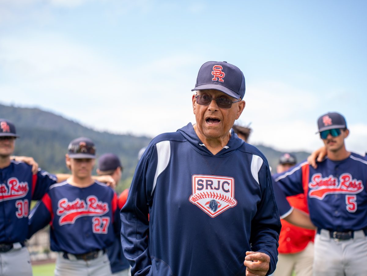 Assistant coach Tom Francois speaks during the team huddle prior to their game against College of Marin in Marin on Saturday, May 2, 2026.