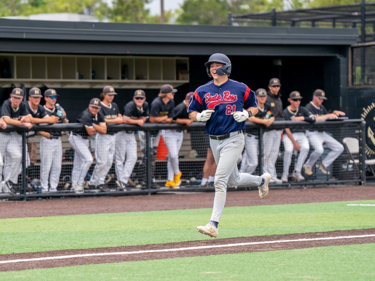 Left fielder Nic Sebastiani is all smiles as he jogs past the Mariners dugout after hitting a homerun in the top of the fourth in Marin on Saturday, May 2, 2026.