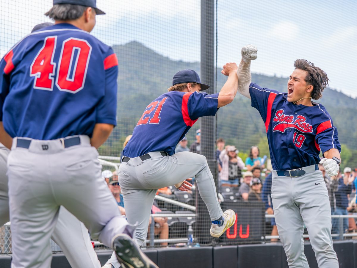 Catcher Chase Sutherland, right, jumps up with left fielder Nic Sebastiani, left, after Sutherland's grand slam against the Mariners on Saturday, May 2, 2026.