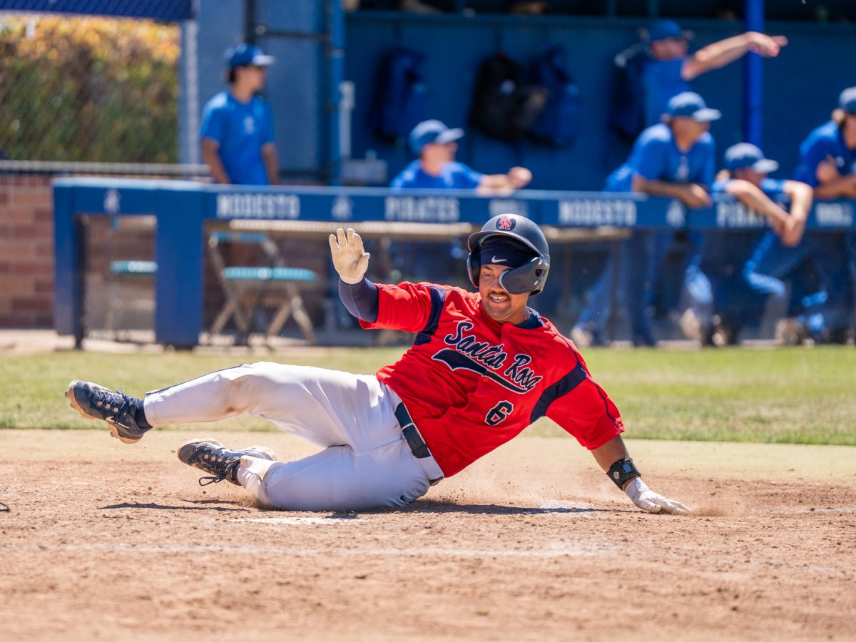 Justice Brinson slide home for another run for the Bear Cubs in the bottom of the fifth against Modesto Junior College in Modesto on Friday, May 8, 2026.