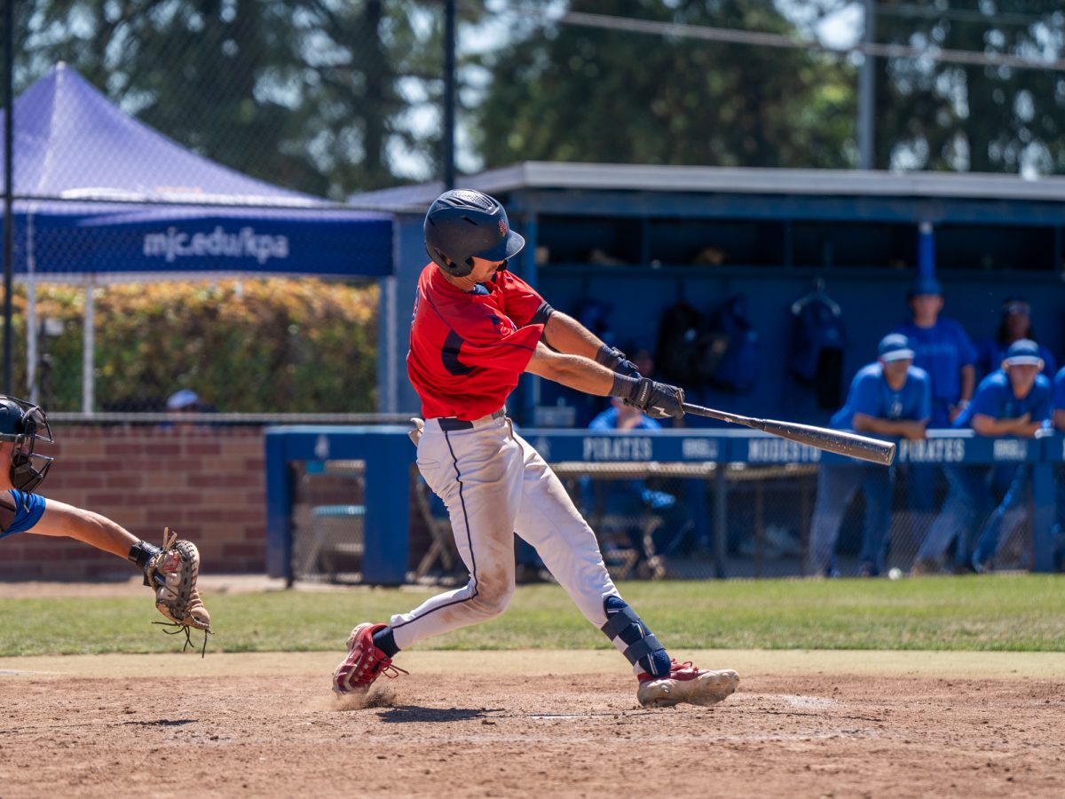 Caze Derammelaere singles on a bunt in the bottom of the fifth against Modesto Junior College in Modesto on Friday, May 8, 2026.