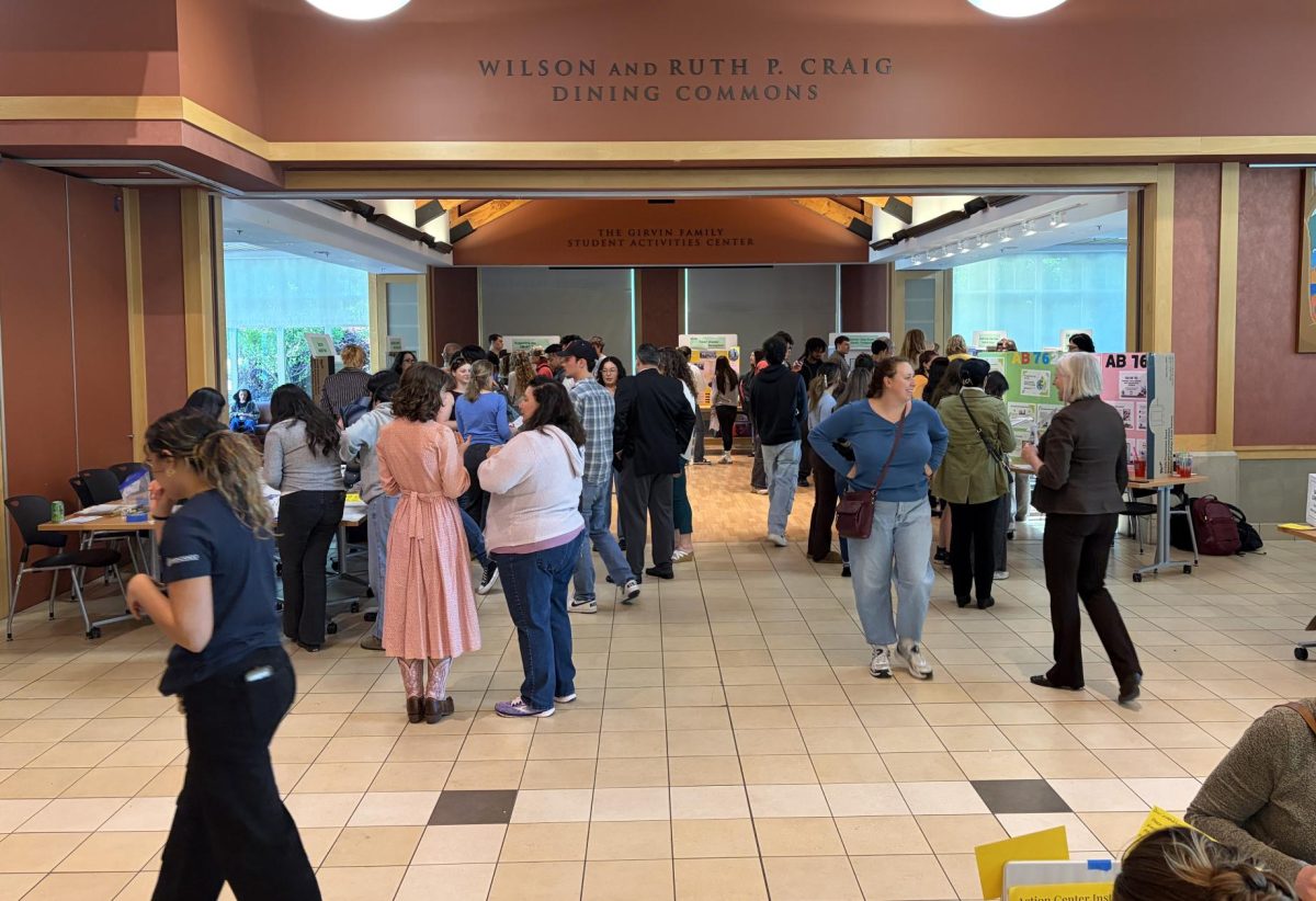 Bertolini hall bustles with activity as students surround the booths at the Bertolini Student Center April 23 