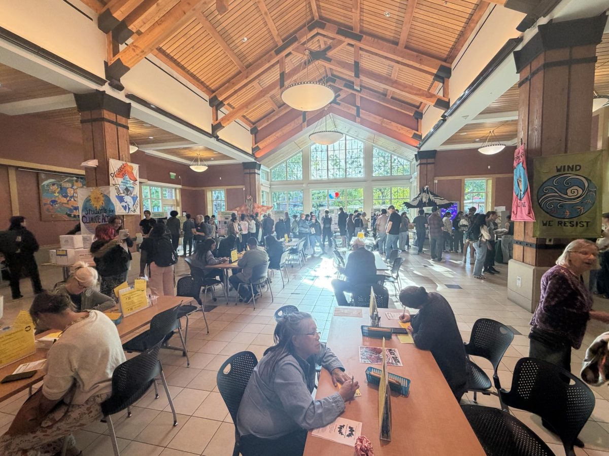 Bertolini hall bustles with activity as students surround the booths at the Bertolini Student Center April 23 