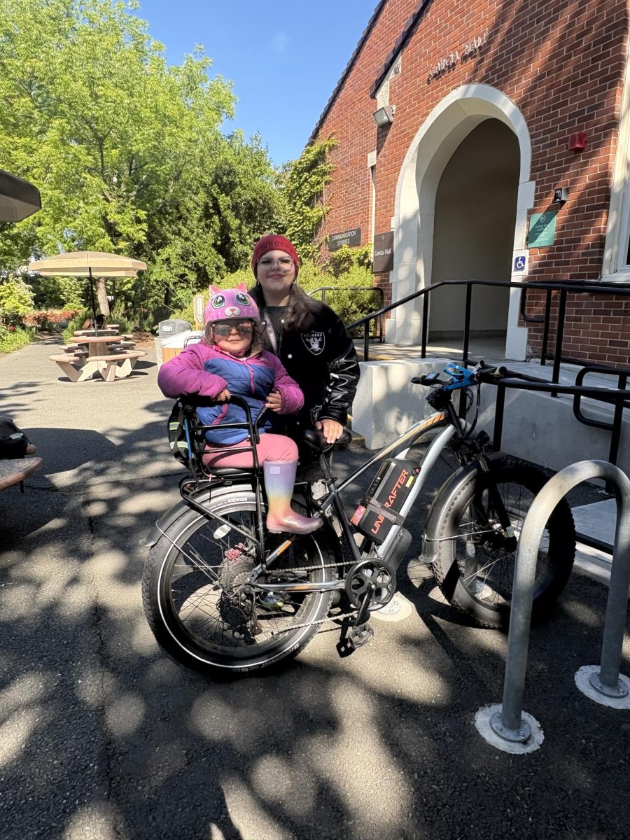 After a scary biking incident, Dolores Gomez and her daughter, Loretta, look forward to the planned bike and pedestrian overcrossing that will stretch from Elliott Avenue across Highway 101 to Edwards Avenue near Coddingtown Mall in Santa Rosa.