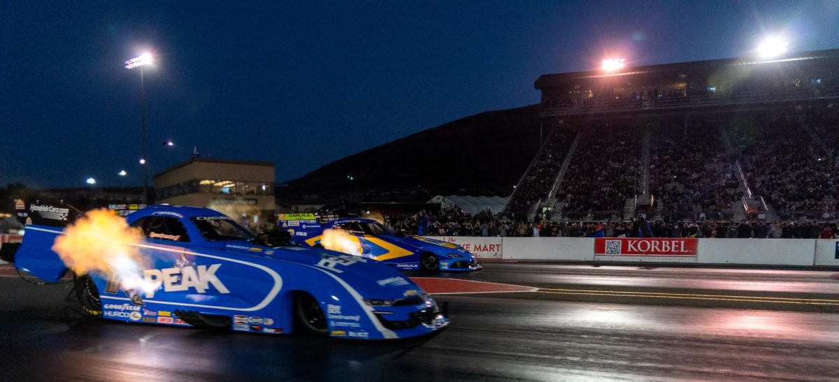Funny Car driver "Fast Jack" Beckman races against Ron Capps during the second round of qualifying at the DENSO NHRA Sonoma Nationals on Friday, July 17, 2026 in Sonoma.