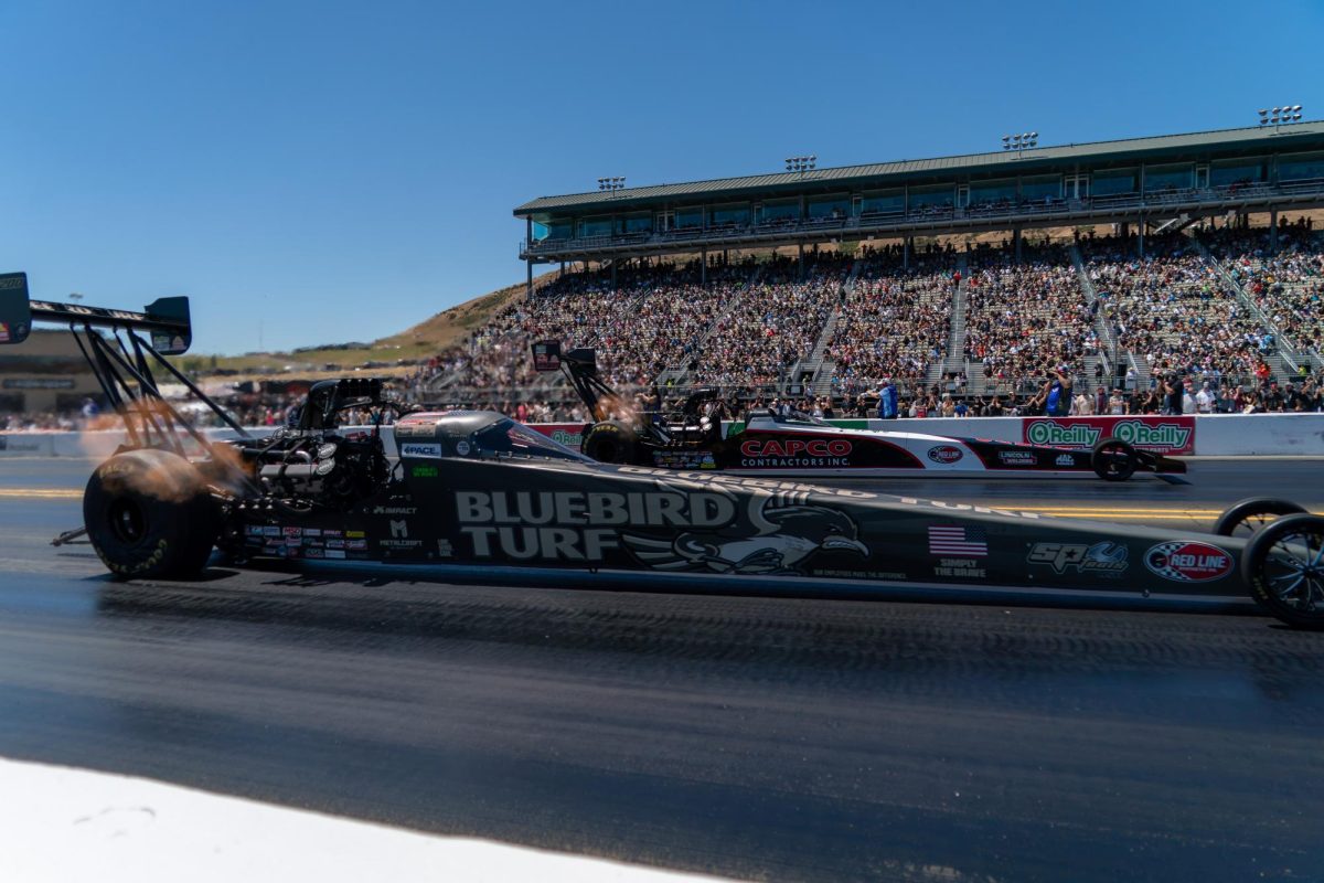 Top Fuel driver Will Smith, front, races against Billy Torrence during the third round of qualifying at the DENSO NHRA Sonoma Nationals on Saturday, July 18, 2026 in Sonoma.
