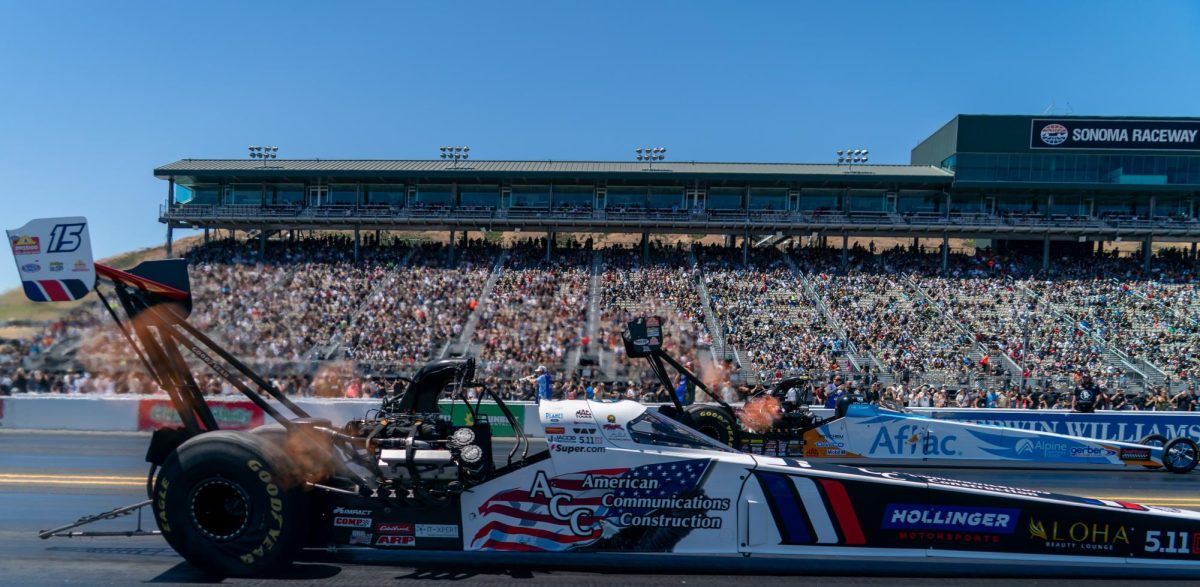 Top Fuel driver Tony Schumacher, front, races against Doug Kalitta during the third round of qualifying at the DENSO NHRA Sonoma Nationals on Saturday, July 18, 2026 in Sonoma.