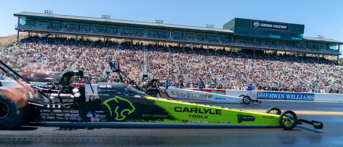 Top Fuel driver Maddi Gordon, front, races against Shawn Langdon during the third round of qualifying at the DENSO NHRA Sonoma Nationals on Saturday, July 18, 2026 in Sonoma.