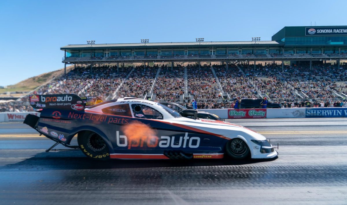 Funny Car driver Chad Green, front, wins against Spencer Hyde during round four of qualifiers at the DENSO NHRA Sonoma Nationals on Saturday, July 18, 2026 in Sonoma.