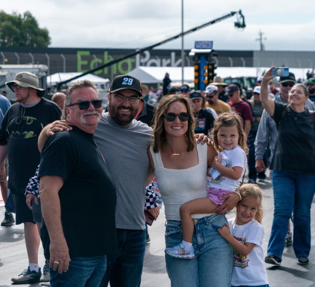 NHRA legend Gary Scelzi and his family walk the drag strip before the finals at the DENSO NHRA Sonoma Nationals on Sunday, July 19, 2026 in Sonoma.