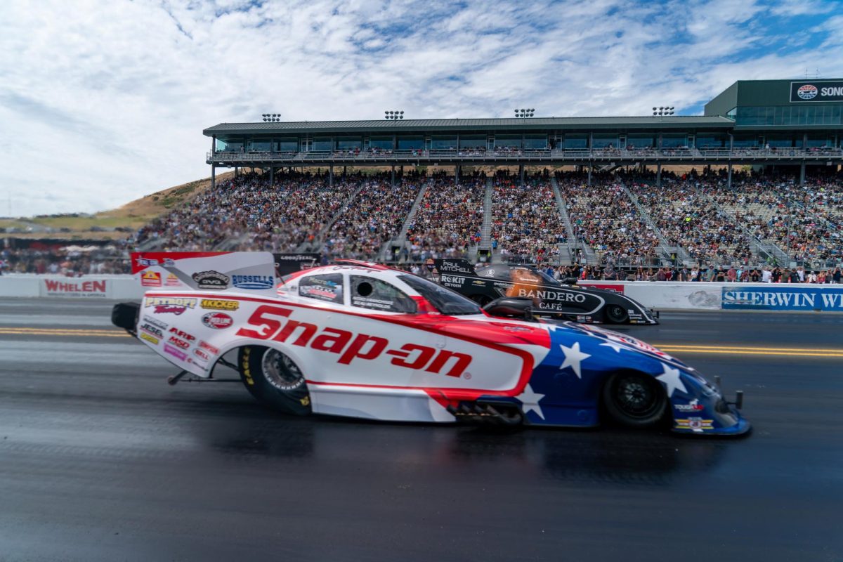 Funny Car driver Cruz Pedregon, front, beats Alexis Dejoria in the first round of eliminations at the DENSO NHRA Sonoma Nationals on Sunday, July 19, 2026 in Sonoma.