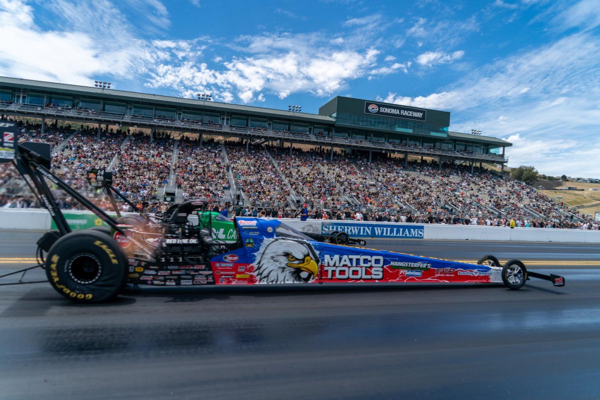 Top Fuel driver Antron Brown, front, beats out Tony Stewart in the second round of eliminations at the DENSO NHRA Sonoma Nationals on Sunday, July 19, 2026 in Sonoma.