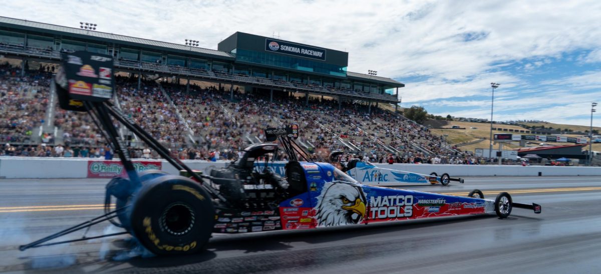Top Fuel driver Antron Brown, front, is eliminated by Doug Kalitta after suffering tire slippage, resulting in his engine shutting off at the DENSO NHRA Sonoma Nationals on Sunday, July 19, 2026 in Sonoma.
