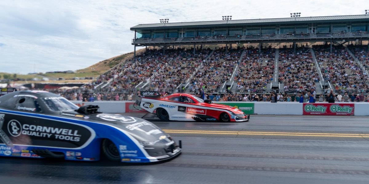 Funny Car driver Austin Prock, back, is defeated by rookie Jordan Vandergriff during the semi-finals at the DENSO NHRA Sonoma Nationals on Sunday, July 19, 2026 in Sonoma.