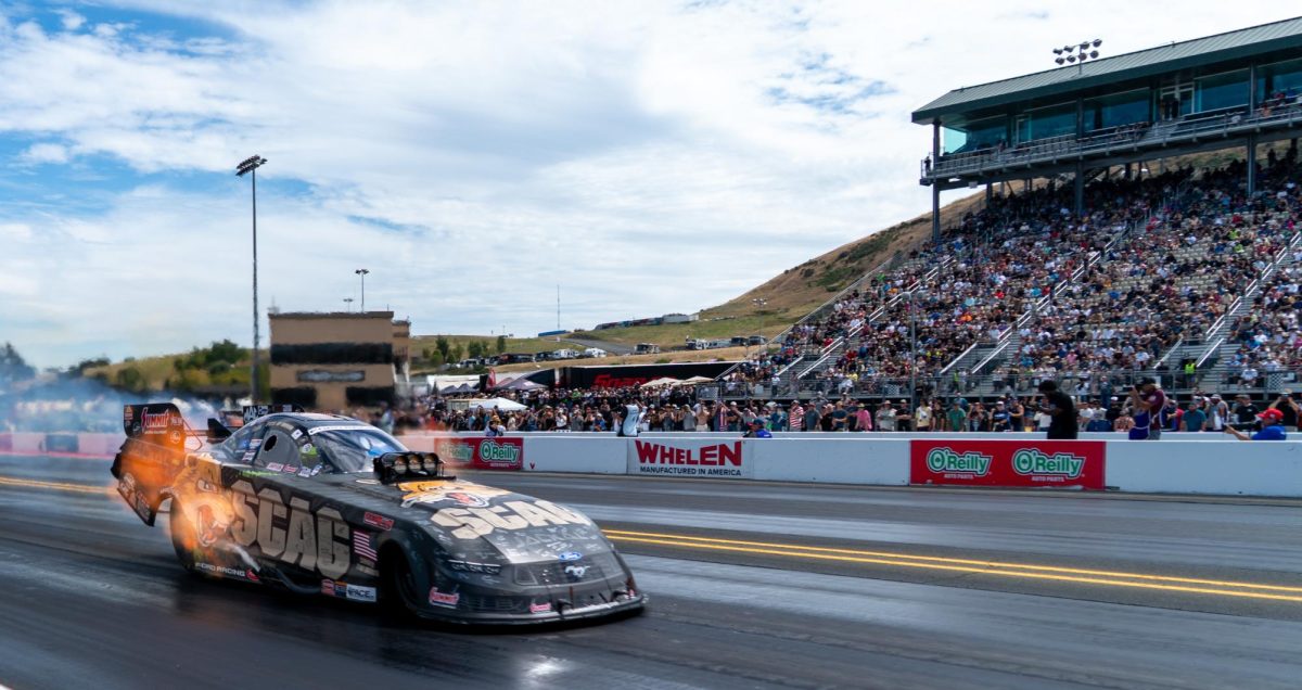 Funny Car driver Daniel Wilkerson, front, advances to the finals after Jack Beckman shuts his engine off early at the DENSO NHRA Sonoma Nationals on Sunday, July 19, 2026 in Sonoma.