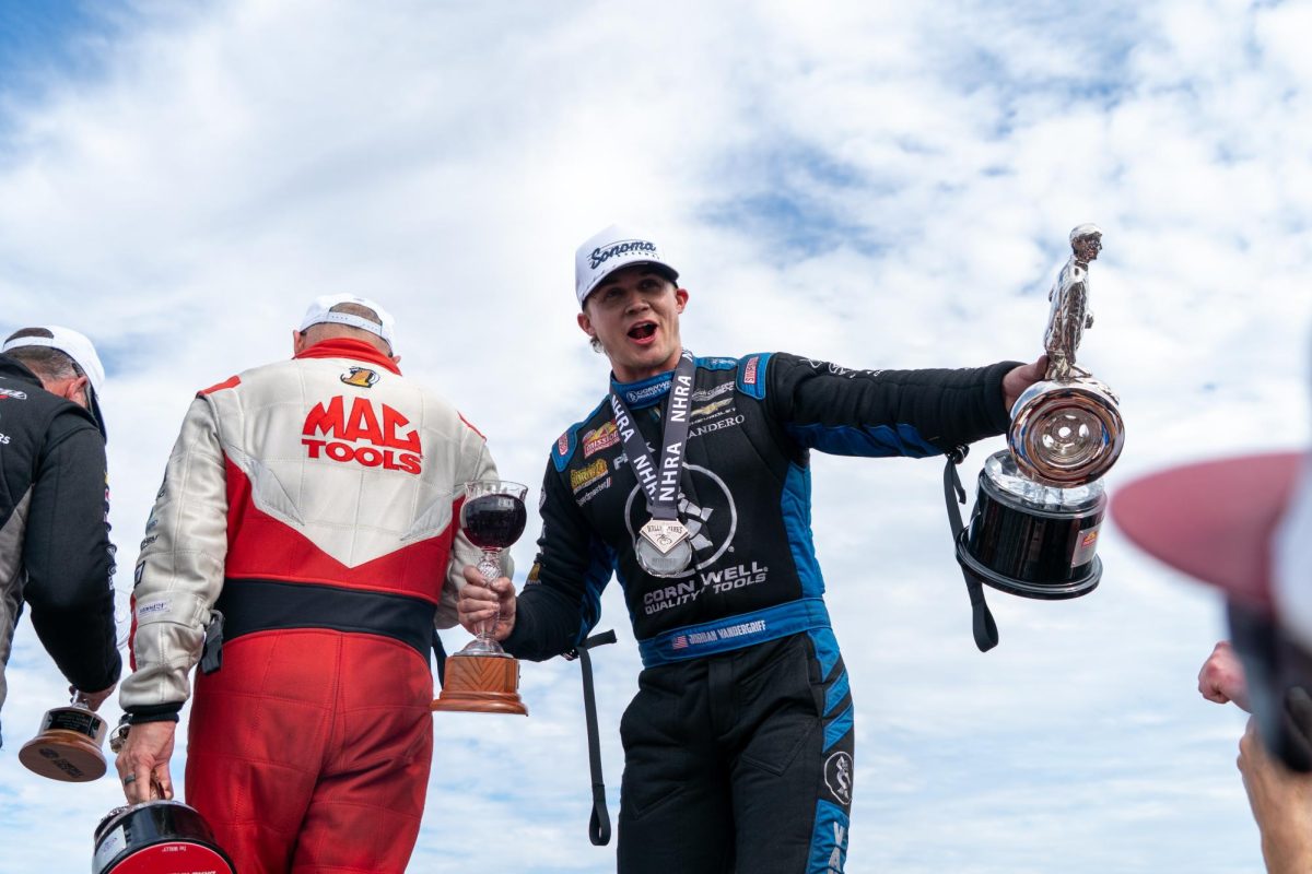 Funny Car driver Jordan Vandergriff amps up the crowd at the victory circle after winning the Wally at the DENSO NHRA Sonoma Nationals on Sunday, July 19, 2026 in Sonoma.