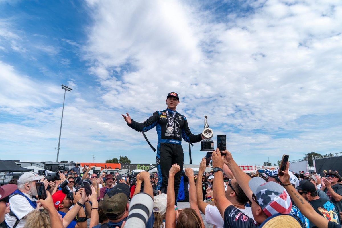 Funny Car driver Jordan Vandergriff amps up the crowd at the victory circle after winning the Wally at the DENSO NHRA Sonoma Nationals on Sunday, July 19, 2026 in Sonoma.