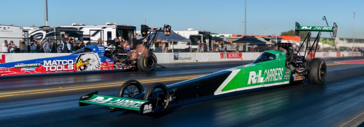 Top Fuel driver Antron Brown, left, is defeated by Tony Stewart during Q1 of the DENSO NHRA Sonoma Nationals on Friday, July 17, 2026 in Sonoma.